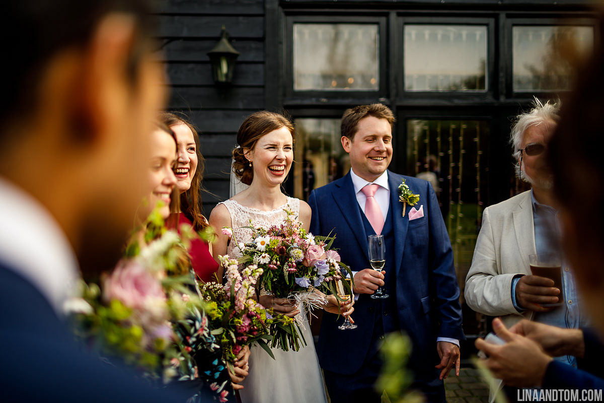 Bride and groom laughing